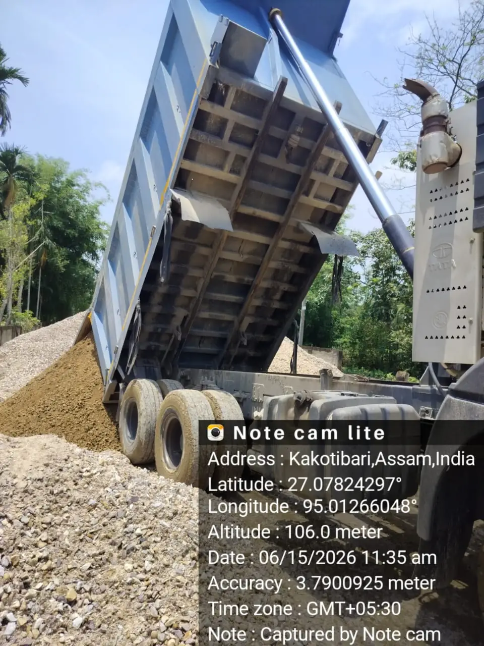 Tipper truck dumping aggregate, Assam