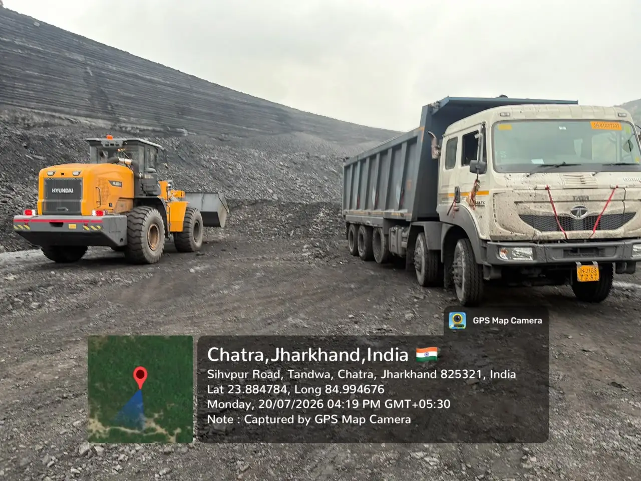 Loader and tipper truck at coal stockpile, Chatra, Jharkhand